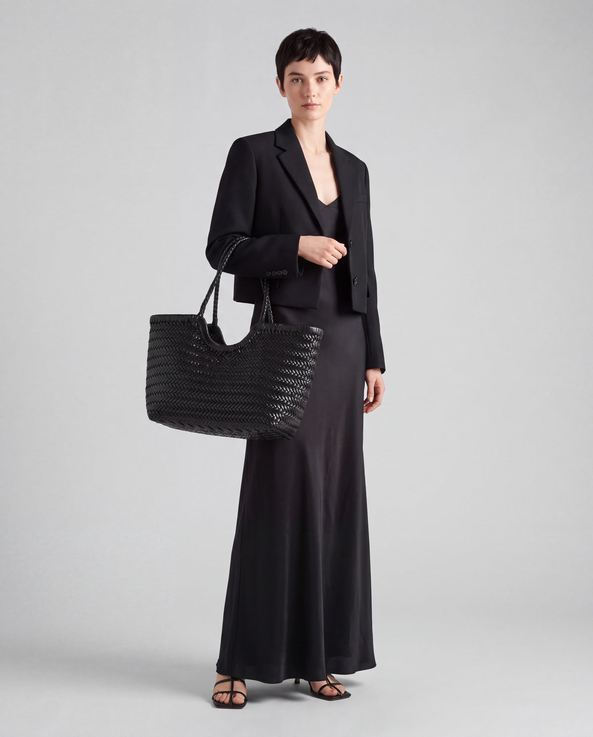 Weave bag in Black – worn by model, full length